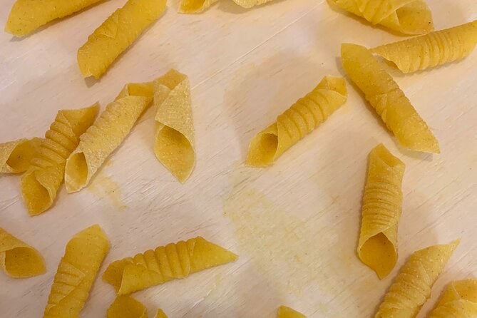 Learn & Eat: fresh pasta masterclass and meal in a local's home - Mastering the Art of Rolling Pasta with a Wooden Cutting Board and Rolling Pin