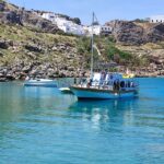 Lindos: Rhodes South-East Coast Cruise with Swim Stops - Exploring the Beaches: Guns of Navarone Bay, Kamares Pirate Caves, and More