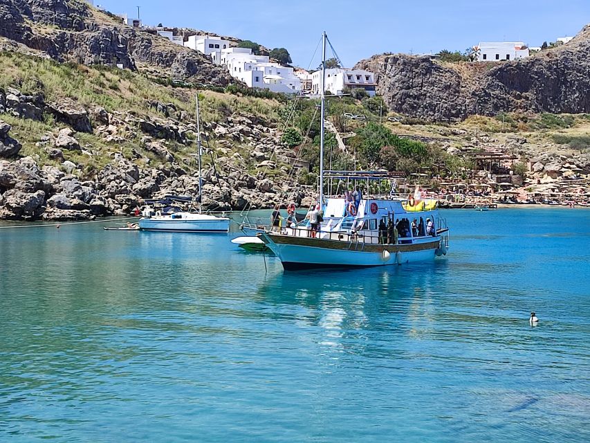 Lindos: Rhodes South-East Coast Cruise with Swim Stops - Exploring the Beaches: Guns of Navarone Bay, Kamares Pirate Caves, and More
