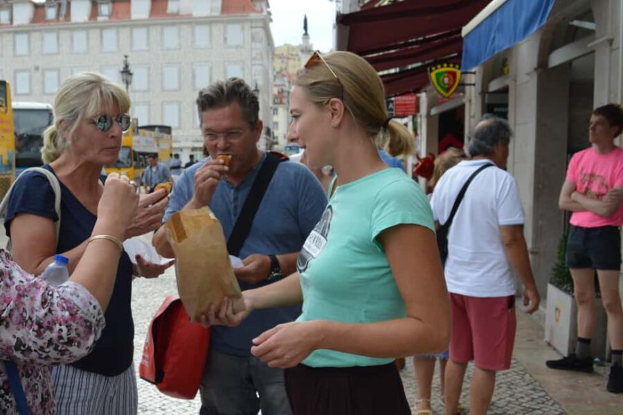 Lisbon: Culinary guided tour with dinner off the beaten track - Exploring Lisbon’s Historic Old Town: Praça da Figueira and Praça do Martim Moniz