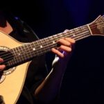 Lisbon: Fado Show and Portuguese Dinner - Meeting at Praça Luis de Camões with a Clear Signal