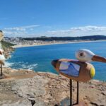 Lisbon: Fátima, Nazaré, and Óbidos Day Trip with Wine - From Pickup to Scenic Electric Car Transfer