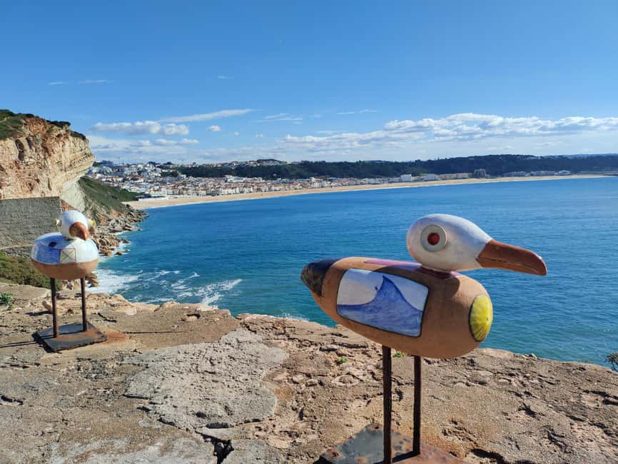 Lisbon: Fátima, Nazaré, and Óbidos Day Trip with Wine - From Pickup to Scenic Electric Car Transfer