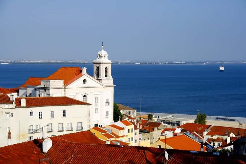 Lisbon Walk: Old Quarter, Hidden Walls & Stunning Views - Starting at Lisbon’s Bustling Praça do Comércio