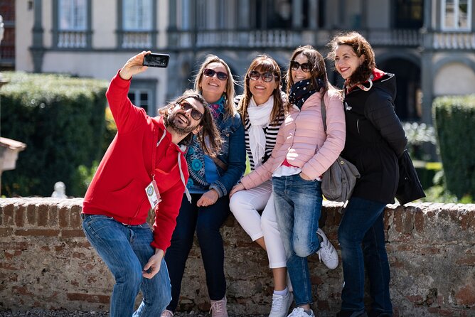 Lucca Aperitivo evening walk with food and wine for Small Groups - Tasting Local Flavors at San Michele in Foro