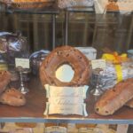 Lucca: Taste Tuscany on a Full Meal Food Tour by Do Eat Better - Savoring Buccellato at Chiesa di San Michele in Foro