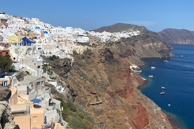 Luxury Full Day Private Sightseeing Tour in Santorini - Visiting the Three Bells of Fira: A Classic Landmark