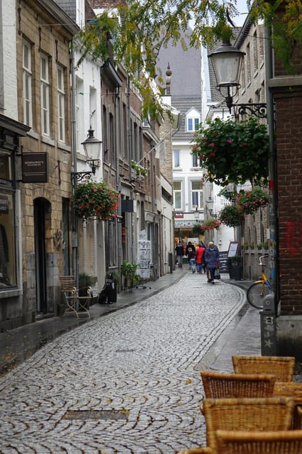 Maastricht: Day trip from Amsterdam with 3 country point - Standing in Three Countries at the Netherlands, Belgium, and Germany Border