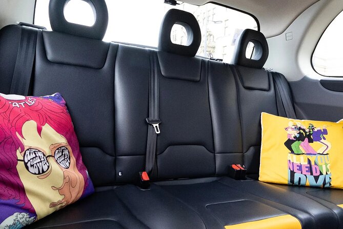 Mad Day Out Beatles Taxi Tours in Liverpool, England - The Unique Charm of the John Lennon Rolls Royce Electric Taxi