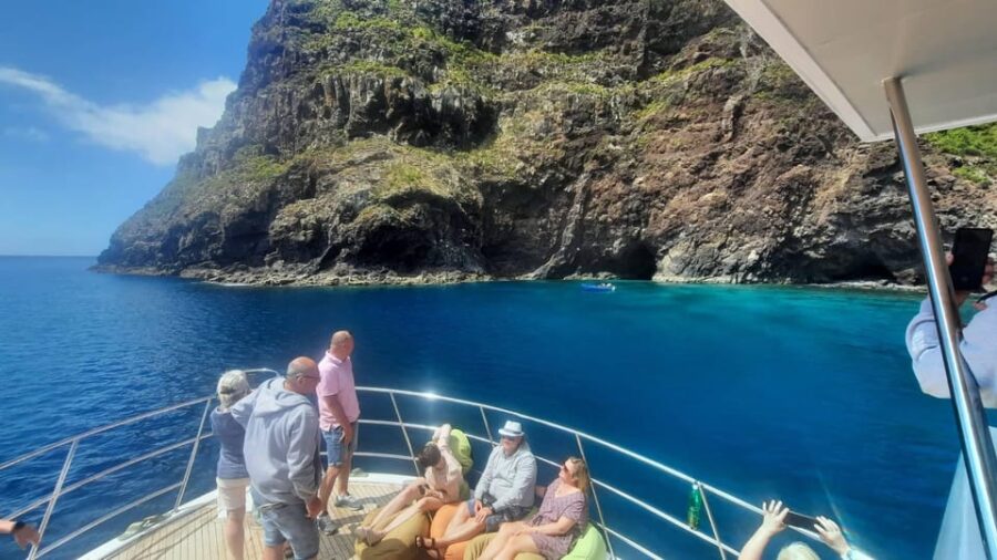 Madeira: Boat Trip with Lunch, Drinks, and Hotel Transfer - Scenic Waters and Waves Crashing Against the Boat