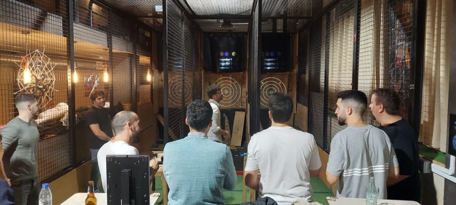 Madrid Center: AXE THROWING - Enjoy Food, Drinks, and Additional Social Activities Upstairs