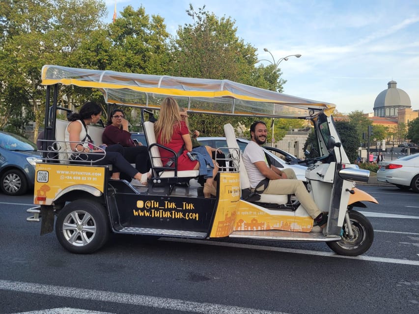 Madrid: Traditional Tour wh Private guide in yellow Tuk Tuk - Start at Plaza Isabel II and Discover Madrids Heart