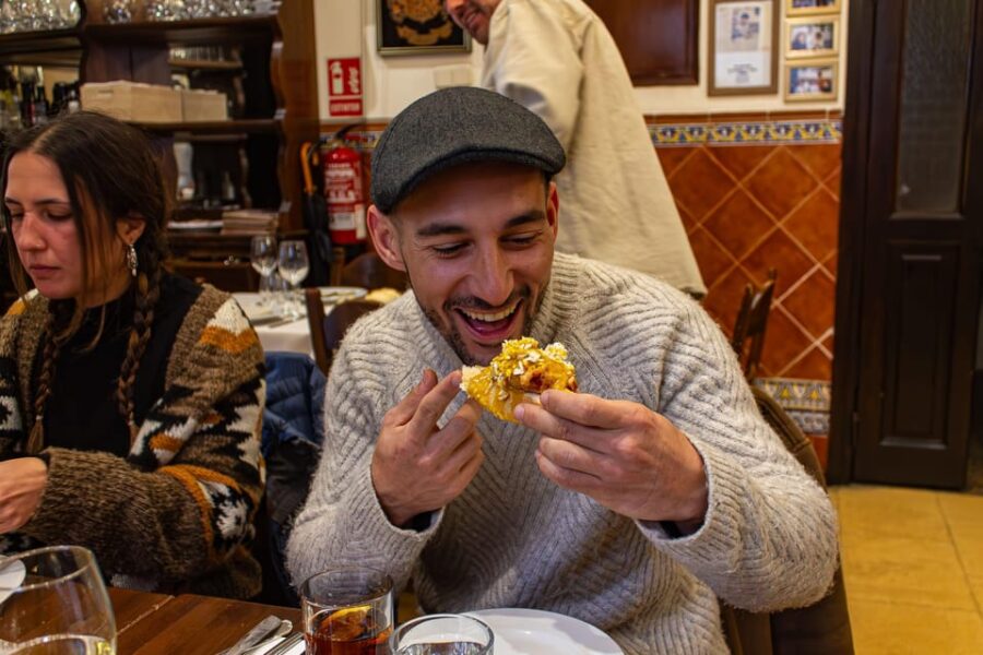 Madrid's Iconic Tapas, Taverns & History Experience - Exploring Madrid’s Historic Royal and Literary Quarters