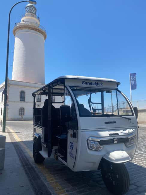 Malaga: Christmas Night Tour and Lights with Tuk Tuk - Unique Christmas Lights Tour by Electric Tuk Tuk in Malaga