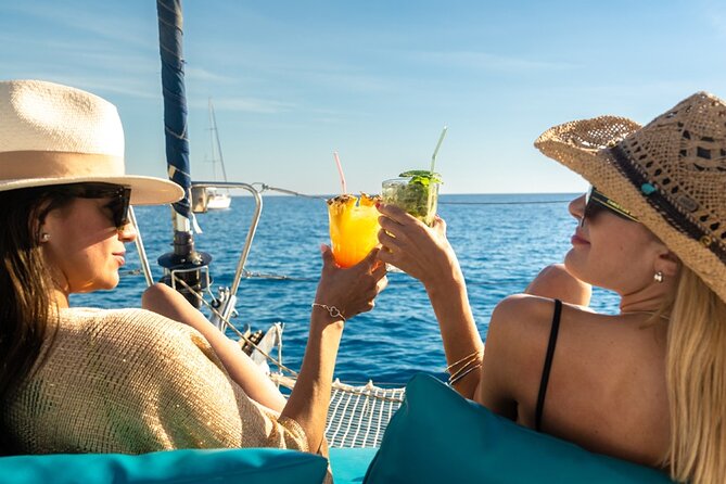 Mallorca Catamaran Small Group Cruise with Tapas 4-hours - Water Activities: Snorkeling, SUP, and Floating Devices