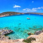 Malta: Blue Lagoon, Comino, and Gozo Boat Tour - Starting Point and Cruise Logistics in Qawra