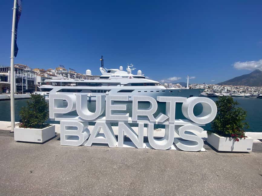 Marbella: Puerto Banus Night Life Walking Tour - Visiting Puerto Banuss Glamorous Harbor by Night