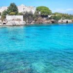 Monopoli: Gozzo Story with Polignano caves, local sailor, and aperitif - The Scenic Return to Monopoli’s Molo Margherita