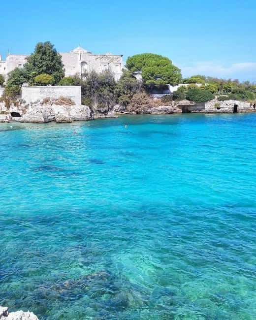 Monopoli: Gozzo Story with Polignano caves, local sailor, and aperitif - The Scenic Return to Monopoli’s Molo Margherita