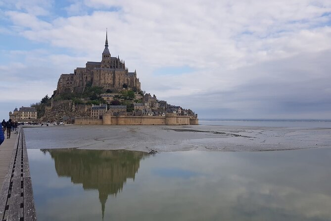 Mont Saint Michel: Explore History and Scenic Views - Discovering the Village and Saint Peters Church
