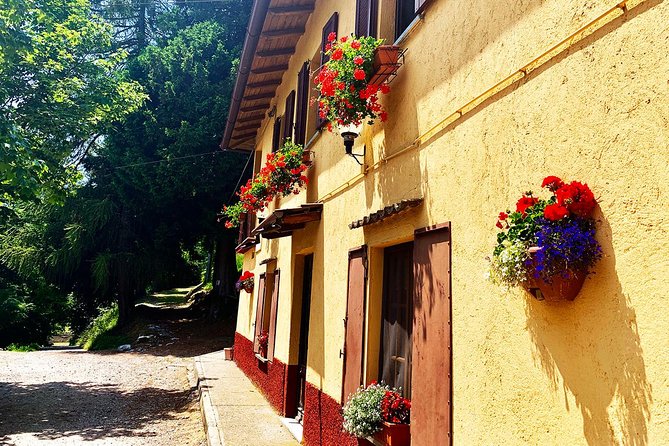 MTB Tour Lake Como Mountain Views & Local Cuisine - Visiting Faro voltiano: A Panoramic Viewpoint