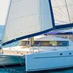 Mykonos Catamaran Delos Rhenia semi private cruise - Setting Sail from Tourlos Marina at 09:00 am