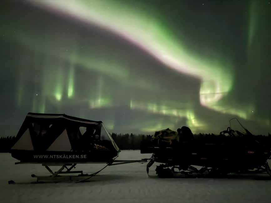 Överkalix - Lapland : Aurora Sled - The Unique Charm of a Snowmobile Sled Ride in Lapland