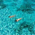 Paphos: Blue Lagoon Boat Cruise with Bus Transfer - The Boat Features and Water Activities at Blue Lagoon