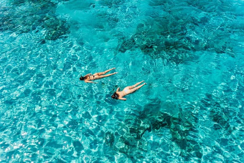 Paphos: Blue Lagoon Boat Cruise with Bus Transfer - The Boat Features and Water Activities at Blue Lagoon