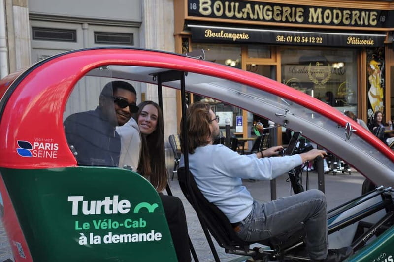 Paris: 2 hours Emily Tour in a Private Rickshaw bike - Starting Point at the Saint-Michel Fountain for a Personalized Paris Experience