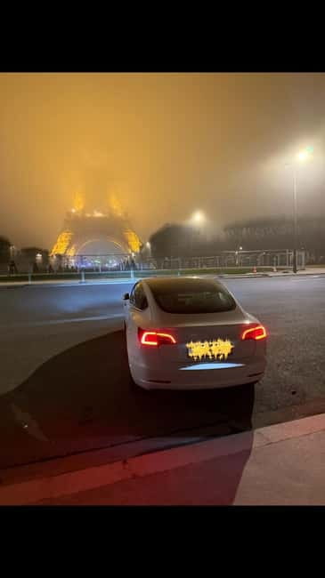 Paris: City Highlights Night Tour in a Tesla - Iconic Views of the Eiffel Tower at Night