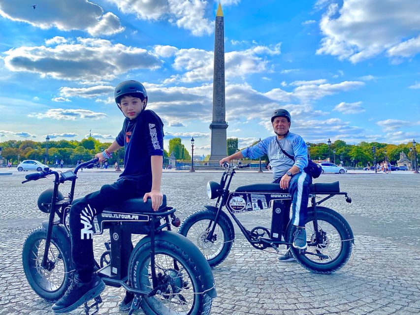 Paris: Eiffel Tower and Notre Dame Night Tour by E-Bike - Riding an E-Bike Through Paris’s Historic Streets