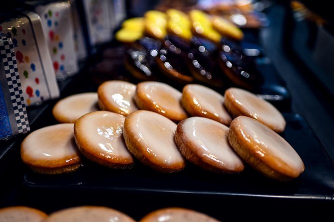 Paris Montmartre Private Walking Food Tour With Secret Food Tours - Unique Fabric Stores in the 18th Arrondissement