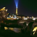 Paris: Panoramic Night Tour with Audio Guide and Host - Visiting Paris Landmarks in a Cozy Coach Ride