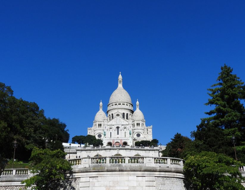 Paris: Sacré-Coeur and Montmartre Tour with Expert Guide - Walking Through Montmartre’s Artistic and Quirky Streets