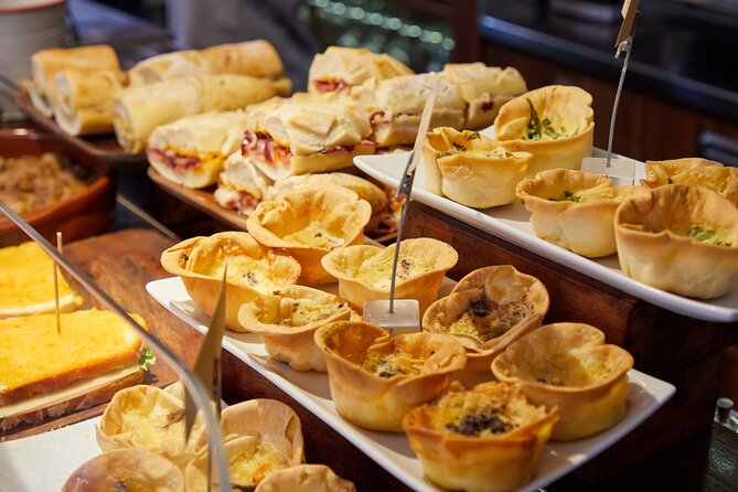 Pintxos Tasting in Bilbao Small Group or Private Walking Tour - Plaza Nueva: The Heart of Bilbao’s Pintxos Scene