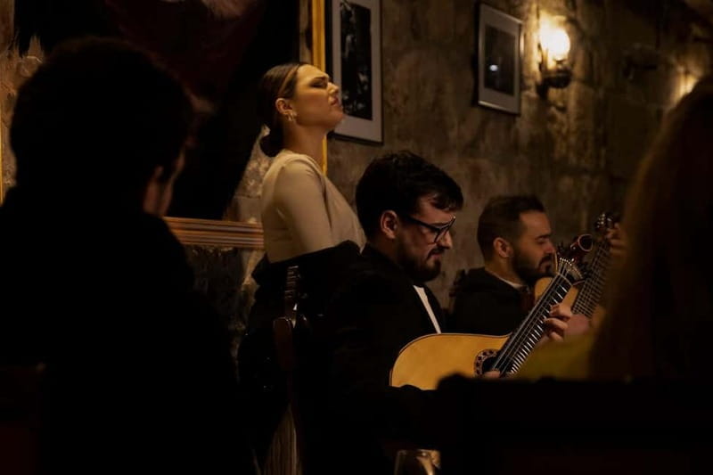 Porto: An Intimate Fado Show in a Historical Tavern - The Unique Duo of Fado Styles Performed