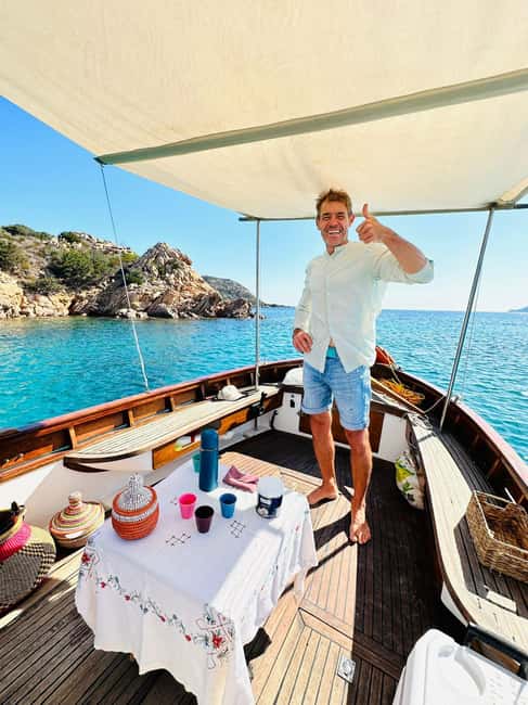 Porto San Paolo: Day Tour to Tavolara and Molara fish-Lunch - Relaxing on a Comfortable Classic Boat