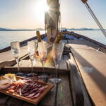 Porto San Paolo: Vintage Cruise Sunset Aperitif to Tavolara - Scenic Views of Tavolara Island and Molara Island