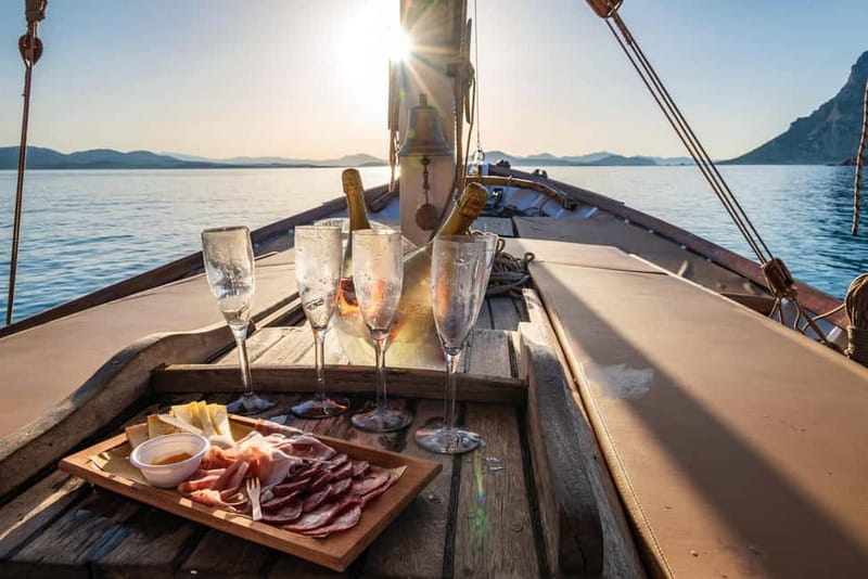 Porto San Paolo: Vintage Cruise Sunset Aperitif to Tavolara - Scenic Views of Tavolara Island and Molara Island