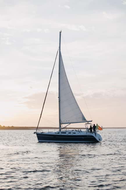 Porto: Sunset Cruise with Welcome Drink in a Sailboat - Passing Porto’s Iconic Bridges