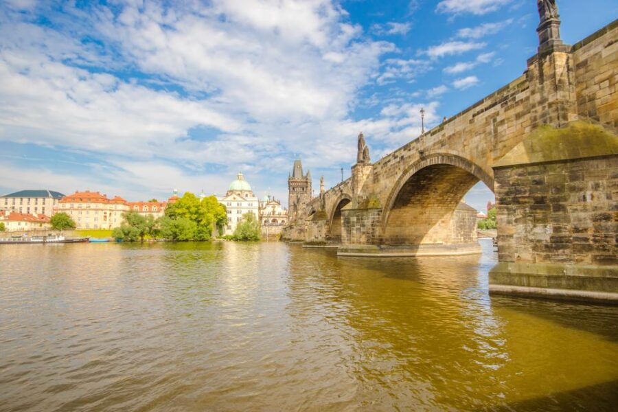 Prague: Guided Bus & Walking Tour with River Cruise & Lunch - Scenic River Cruise with Buffet Lunch