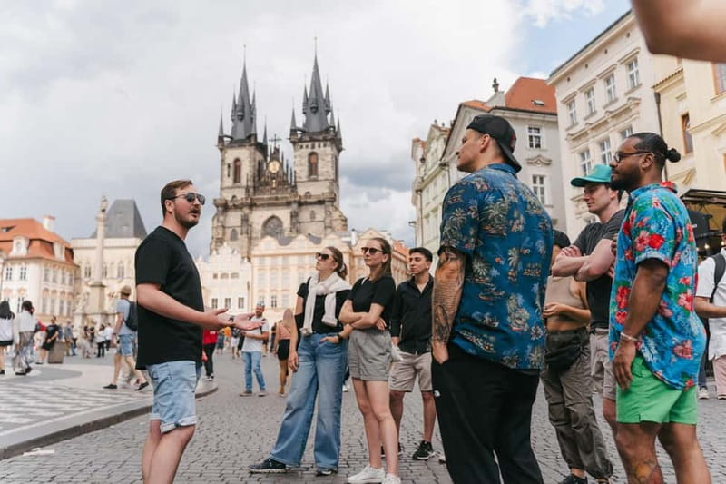 Prague: Old Town, Prague Castle & River Cruise Day Tour - Exploring Charles Bridge with a Guided Walk