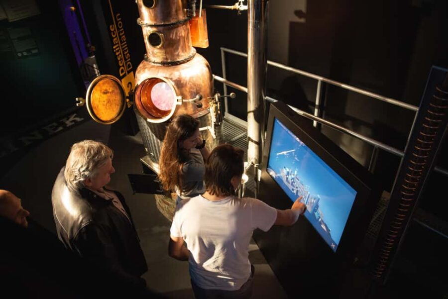 Prague: walking tour: current life & Slivovitz museum visit - Starting at Cartier and Exploring Prague’s Historic Districts