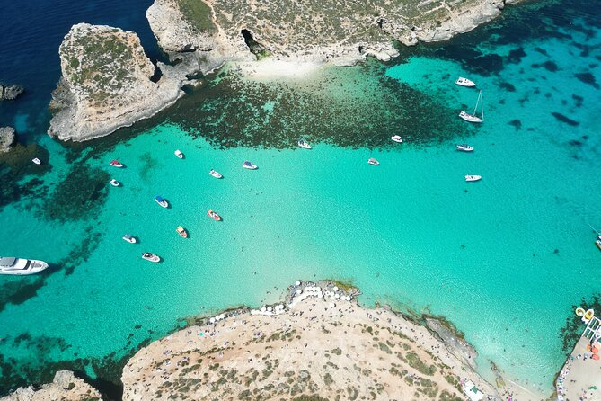 Private Boat, Blue lagoon, Crystal lagoon Comino, Gozo Malta Ultimate Highlights - Explore Comino’s Lagoon Highlights