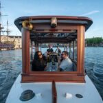 Private Boat Tour Amsterdam - 90 Min incl. welcome drink on historic saloon boat - Embark from Oosterdokskade for a Central Starting Point