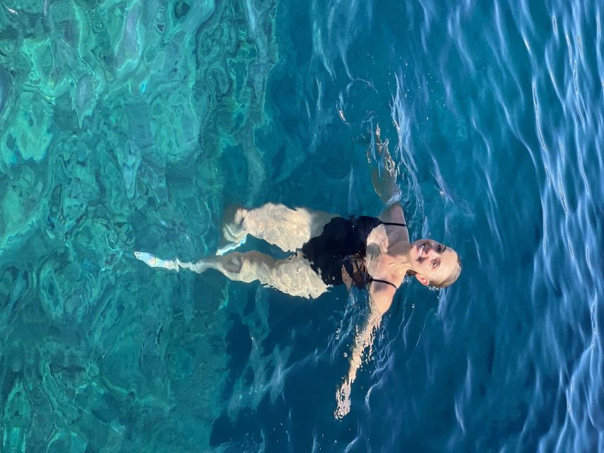 Private Boat tour with snorkeling & Sea Caves - Explore Santorini’s Iconic Beaches: Red and White Beaches