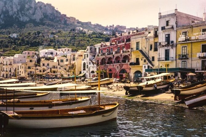 Private Capri Luxury Boat Experience: Cruise, Swim & Sunbathe - Exploring Capri’s Dramatic Coastline and Iconic Cliffs