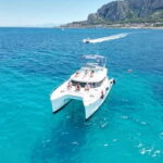 Private Catamaran Tour West Coast of Palermo with Lunch and Snorkeling - Exploring the Bay of Vergine Maria: Swimming and Snorkeling