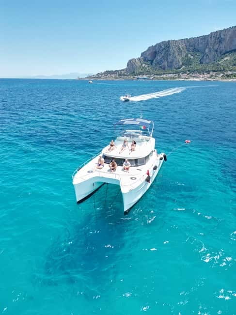 Private Catamaran Tour West Coast of Palermo with Lunch and Snorkeling - Exploring the Bay of Vergine Maria: Swimming and Snorkeling